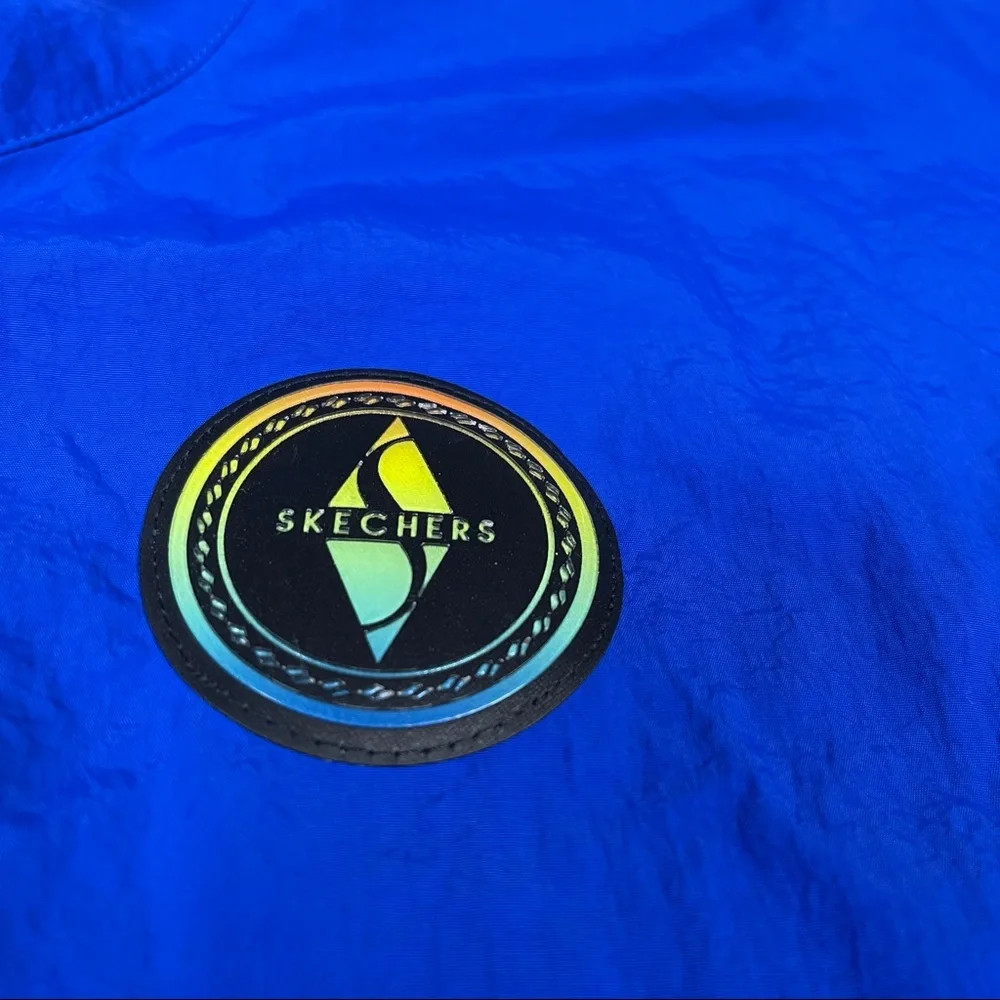 Skechers blue windbreaker